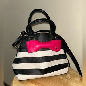 Small Betsey Johnson Purse. Black and white with pink bow
